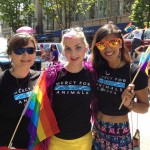 Alison, Jenni, and Cynthia participating in Vancouver's Pride Parade