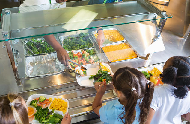 Cafeteria serving lunches to children